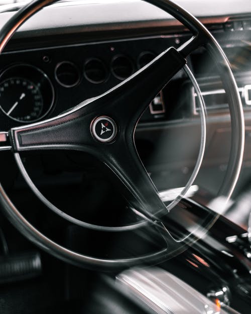 有关垂直拍摄, 徽章, 方向盘的免费素材图片