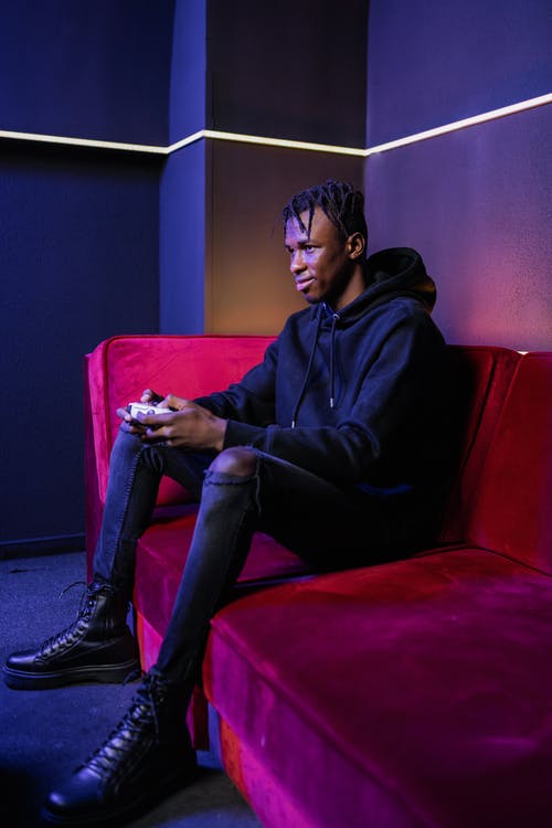 有关人, 坐, 垂直拍摄的免费素材图片