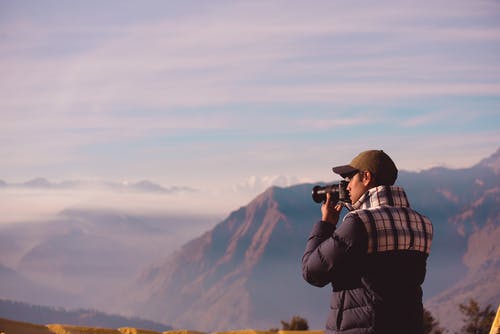 有关人, 单反相机, 垂直拍摄的免费素材图片