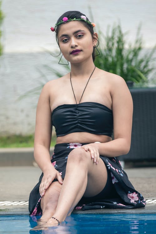 有关坐, 垂直拍摄, 拍照片的免费素材图片