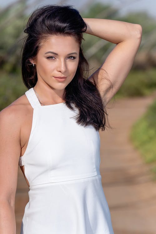 有关垂直拍摄, 女人, 摆姿势的免费素材图片