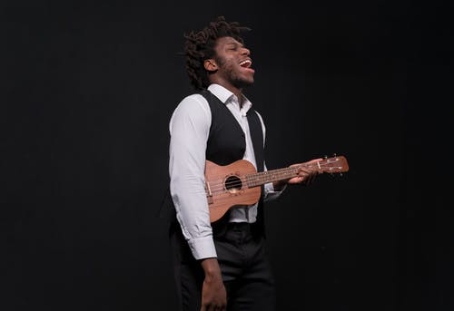 有关人, 吉他手, 四弦琴的免费素材图片