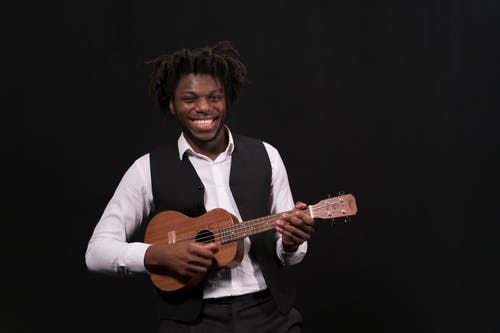 有关人, 吉他手, 四弦琴的免费素材图片