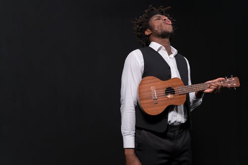 有关人, 吉他手, 四弦琴的免费素材图片