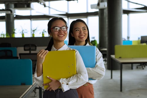 有关同事, 女性, 工作场所的免费素材图片