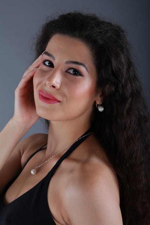 有关垂直拍摄, 女人, 摆姿势的免费素材图片