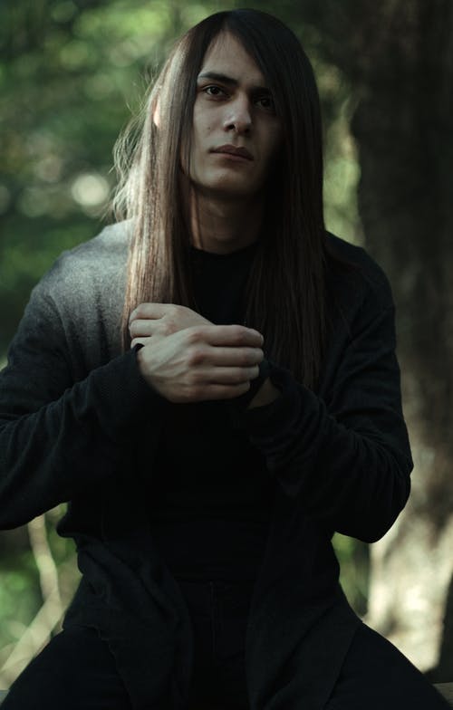 有关人, 严肃, 垂直拍摄的免费素材图片