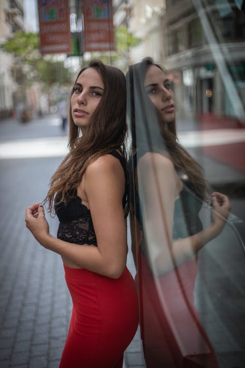 有关侧面图, 咖啡色头发的女人, 垂直拍摄的免费素材图片