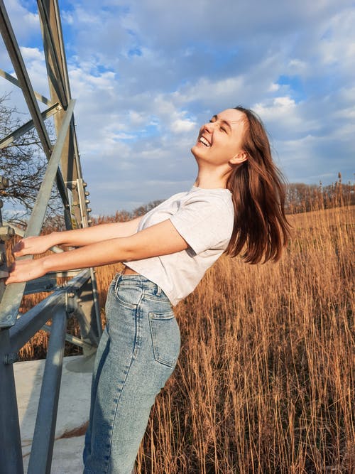 有关垂直拍摄, 女人, 微笑的免费素材图片