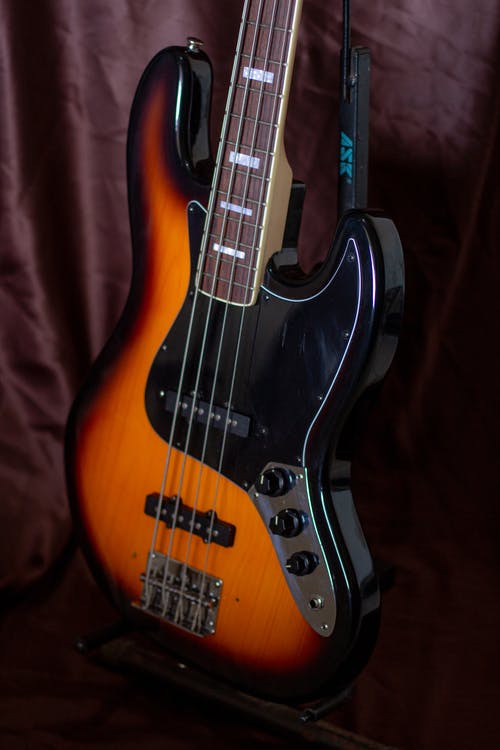 有关仪器, 吉他, 垂直拍摄的免费素材图片