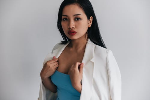 有关人, 女人, 男女西装外套的免费素材图片