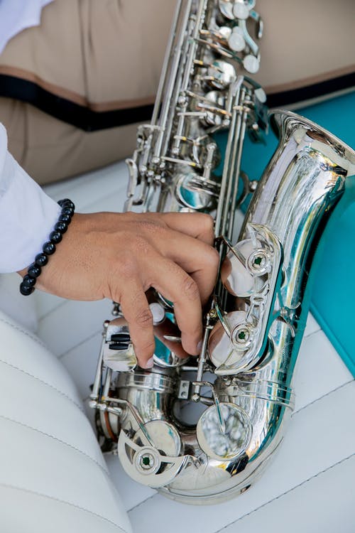 有关垂直拍摄, 握住, 樂器的免费素材图片
