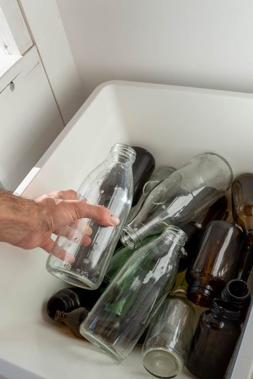 有关回收, 垂直拍摄, 握住的免费素材图片