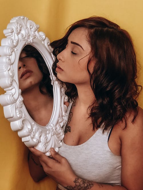 有关刺青, 反射, 垂直拍摄的免费素材图片