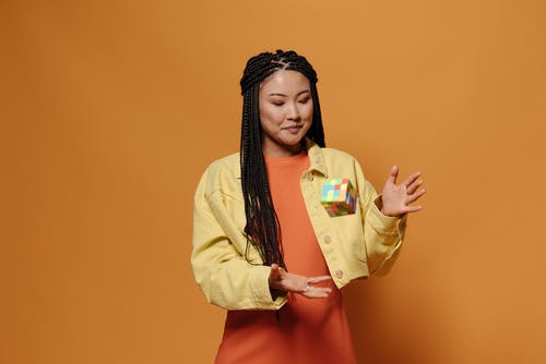 有关orange_background, rubiks立方体, 向上丢的免费素材图片