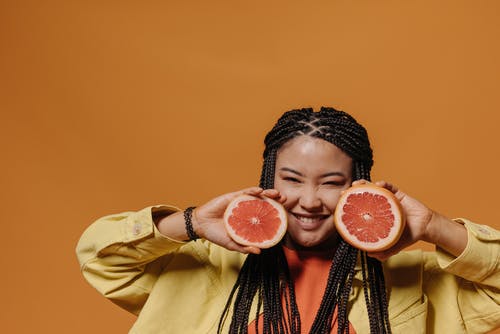 有关orange_background, 女人, 展示的免费素材图片