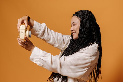 有关orange_background, 侧面图, 即时相机的免费素材图片