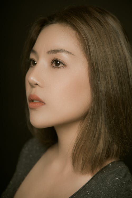 有关侧面轮廓, 垂直拍摄, 女人的免费素材图片