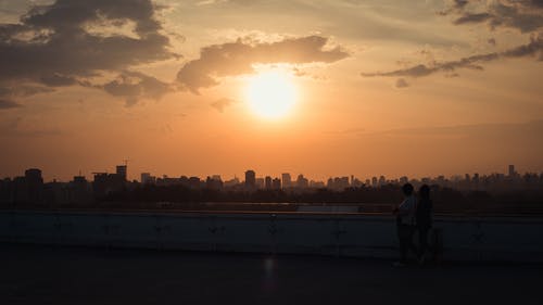 有关傍晚的太阳, 剪影, 城市的免费素材图片