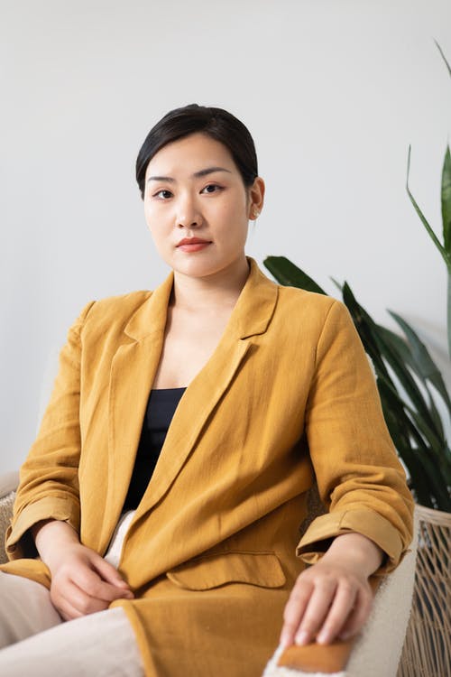 有关人, 坐, 垂直拍摄的免费素材图片