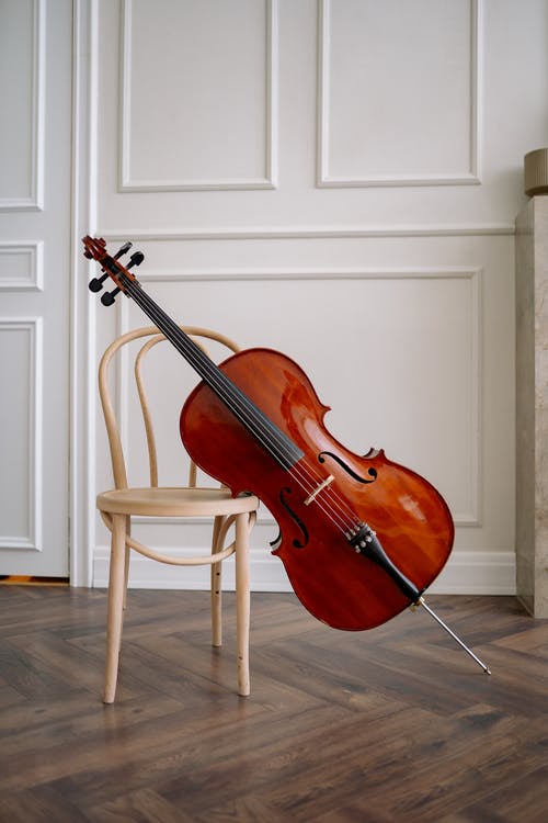有关垂直拍摄, 大提琴, 椅子的免费素材图片