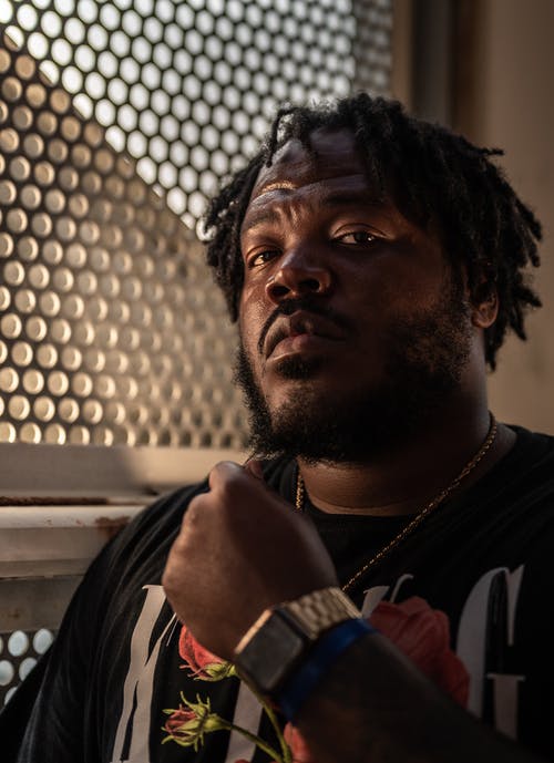 有关人, 嚴肅, 垂直拍摄的免费素材图片