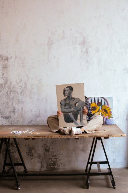 有关人, 坐, 垂直拍摄的免费素材图片