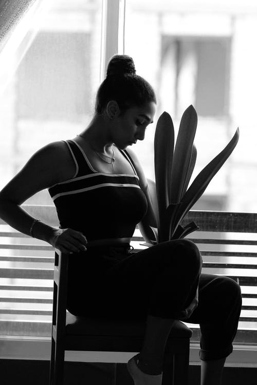 有关发髻, 坐, 垂直拍摄的免费素材图片