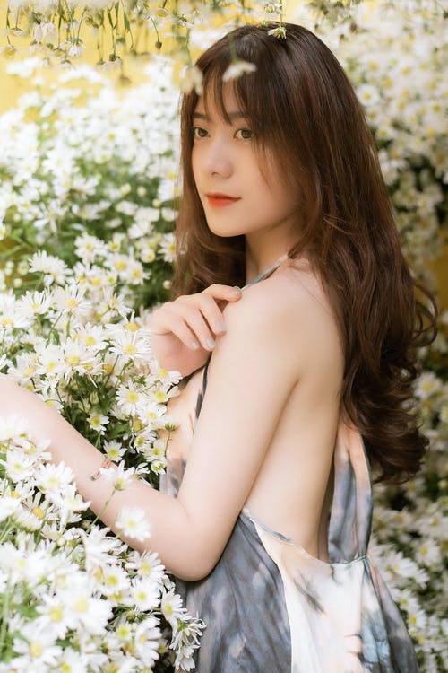 有关垂直拍摄, 女人, 摆姿势的免费素材图片