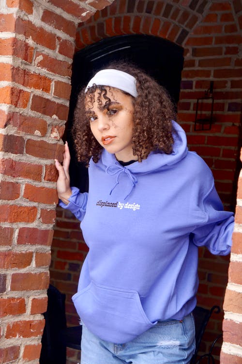 有关严肃, 垂直拍摄, 女人的免费素材图片