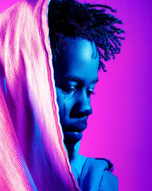 有关人, 哭, 垂直拍摄的免费素材图片