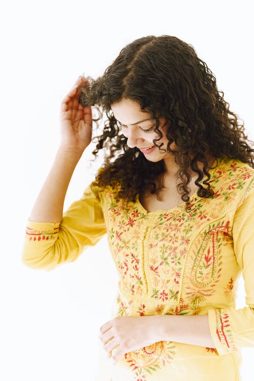 有关优雅, 垂直拍摄, 女人的免费素材图片