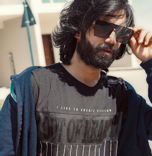 有关墨镜, 户外, 握住的免费素材图片