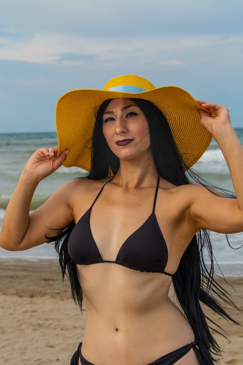 有关垂直拍摄, 女人, 帽子的免费素材图片