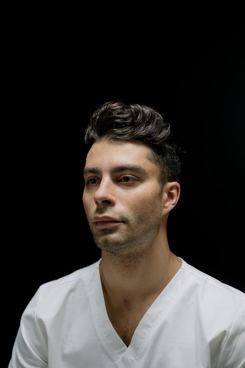 有关人, 严肃, 垂直拍摄的免费素材图片