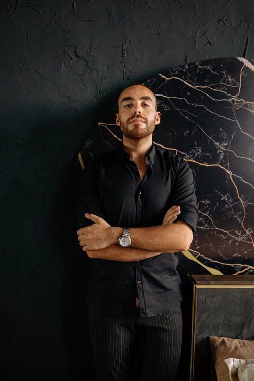 有关人, 双臂交叉, 垂直拍摄的免费素材图片