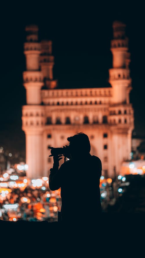 有关剪影, 单反相机, 垂直拍摄的免费素材图片