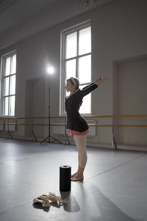 有关伸展, 垂直拍摄, 女人的免费素材图片