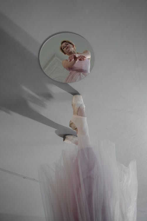 有关反射, 垂直拍摄, 女人的免费素材图片