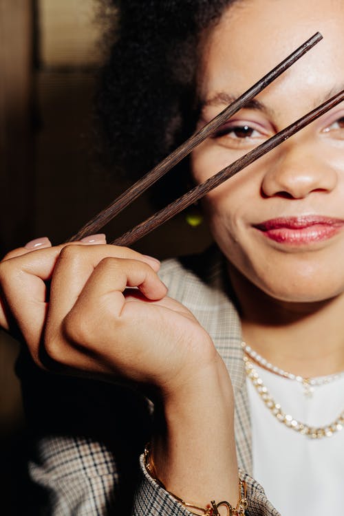 有关垂直拍摄, 握住, 特写的免费素材图片