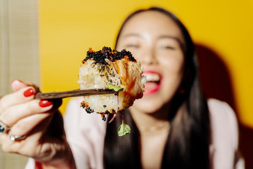 有关吃, 寿司, 女人的免费素材图片