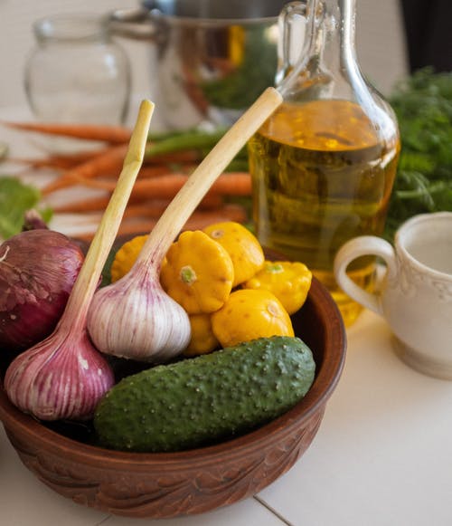 有关垂直拍摄, 大蒜, 小黄瓜的免费素材图片