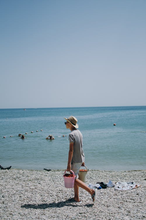 有关人, 垂直拍摄, 岸边的免费素材图片