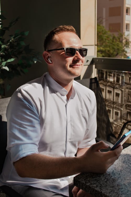 有关人, 坐, 垂直拍摄的免费素材图片