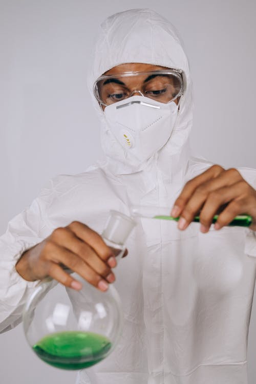 有关ppe, 倾注, 危险品套装的免费素材图片