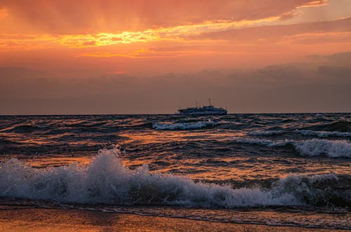 有关岸边, 招手, 日落的免费素材图片