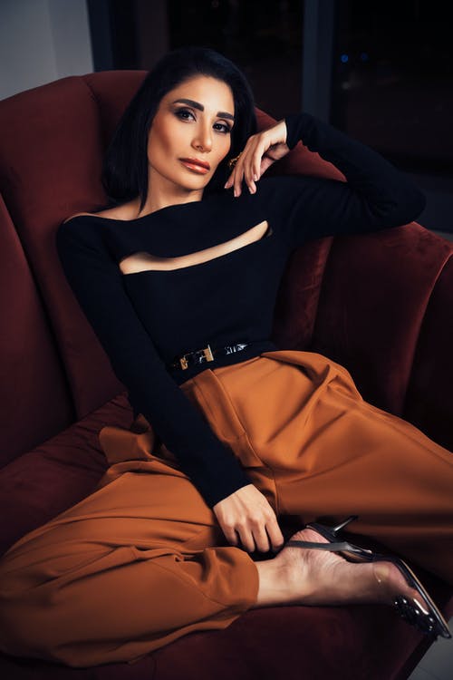 有关光鲜亮丽, 坐, 垂直拍摄的免费素材图片