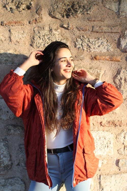 有关双手举起, 垂直拍摄, 女人的免费素材图片