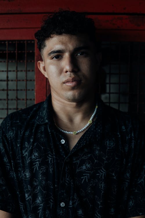 有关人, 严肃, 垂直拍摄的免费素材图片