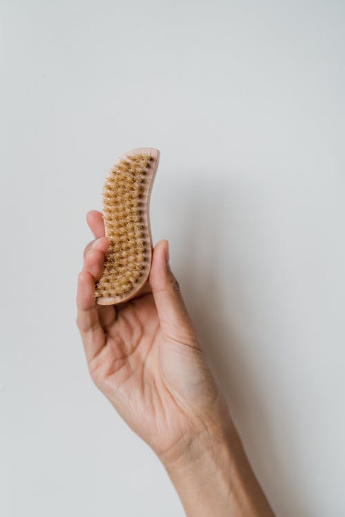 有关个人卫生, 垂直拍摄, 握住的免费素材图片